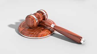 3D Render of Wooden Judge Gavel and Sound Block on White Background