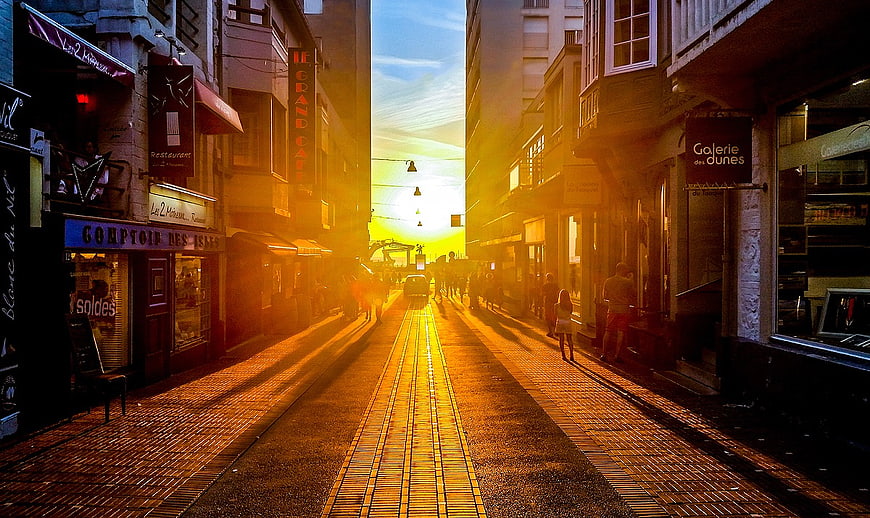 Golden Hour Tram Tracks on European Pedestrian Street