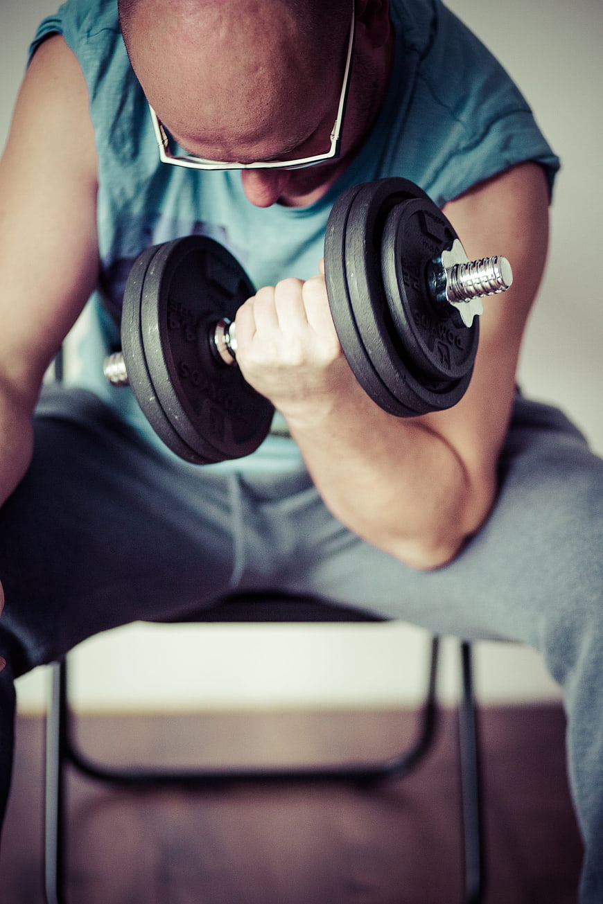 Man lifting dumbbells for strength training