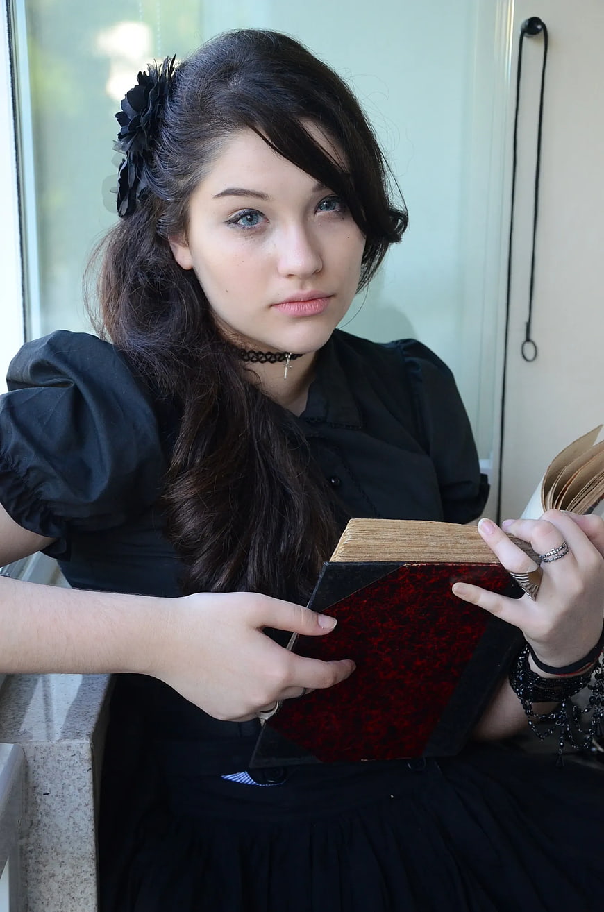 Gothic Woman Reading Old Book by Window