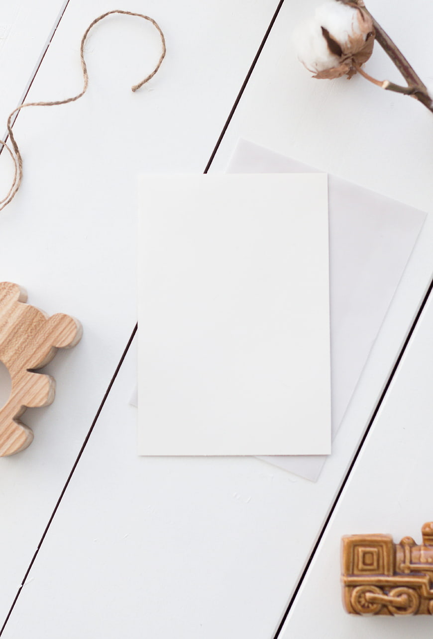 White Card Mockup Flat Lay With Wooden Train And Cotton
