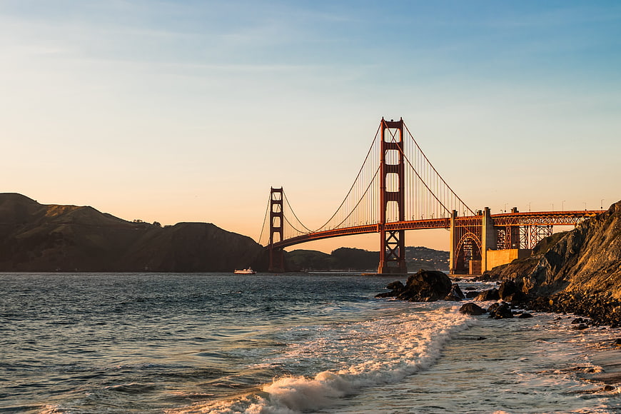 Golden Gate Bridge at Sunset with Ocean Waves