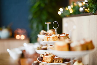 Festive Mini Cakes on Tiered Stand with Christmas Decor
