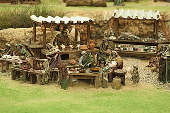 Detailed miniature nativity market scene with figurines
