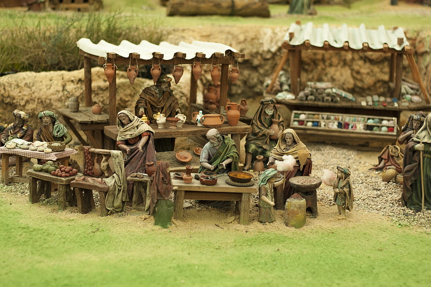 Detailed miniature nativity market scene with figurines