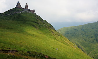 Gergeti Trinity Church on Green Mountain Ridge in Georgia