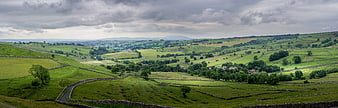 Panoramic View of Rolling Green Hills and Dry Stone Walls in Yorkshire Dales