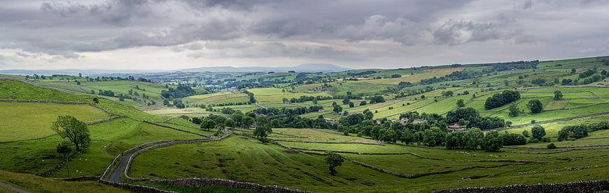 Panoramic View of Rolling Green Hills and Dry Stone Walls in Yorkshire Dales