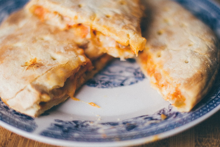 Close-up of homemade cheese pie on blue patterned plate