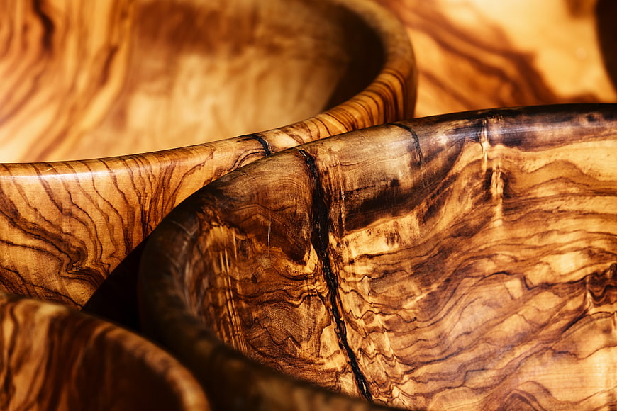 Close-up of Handcrafted Olive Wood Bowls with Rich Grain