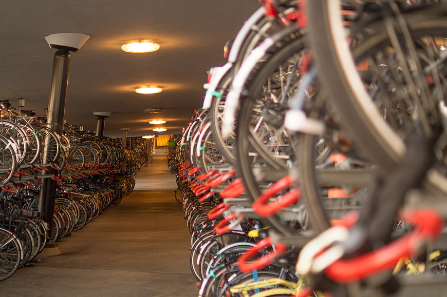 Rows of bicycles in indoor parking garage