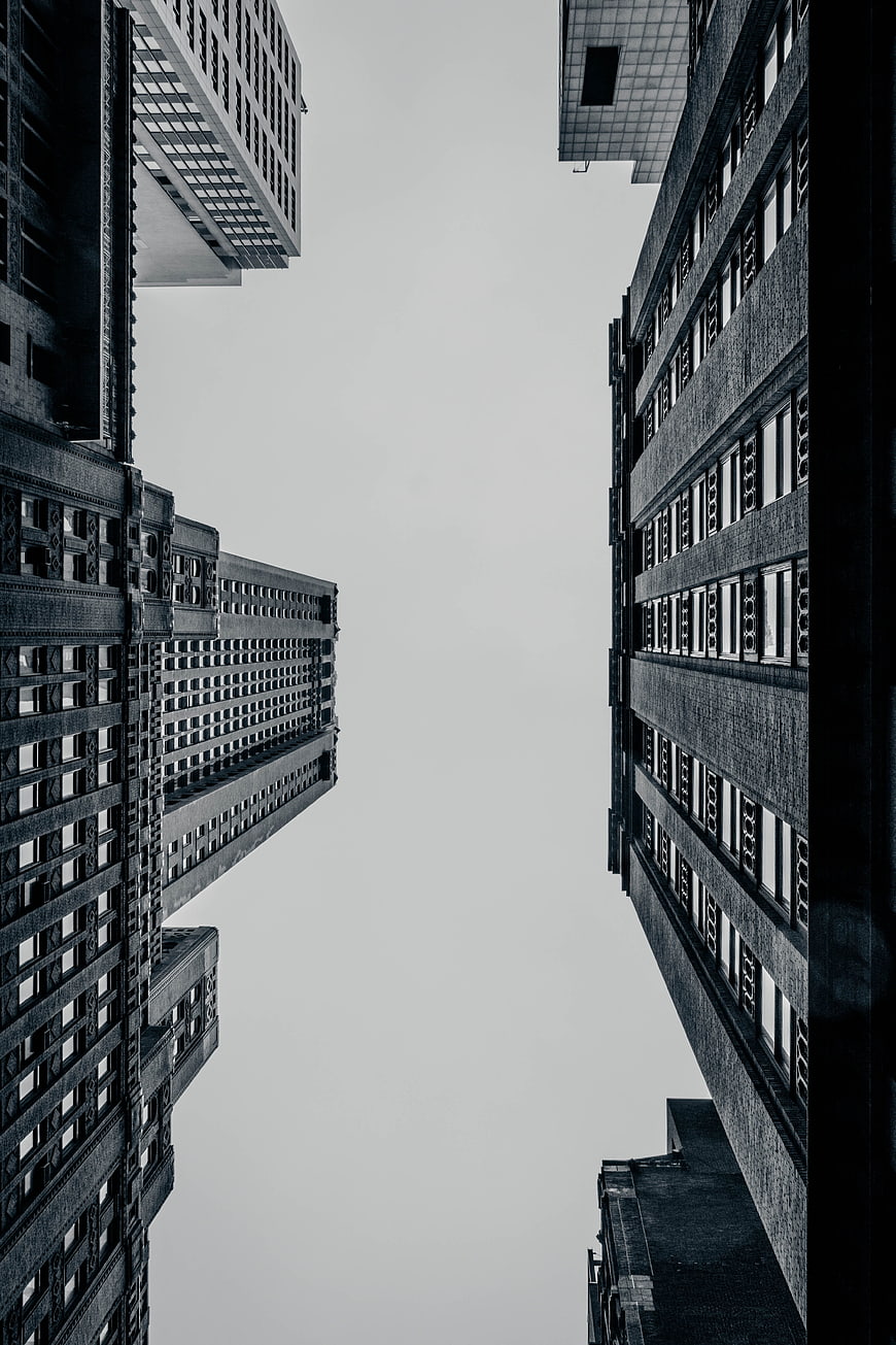 Black and white low angle view of skyscrapers