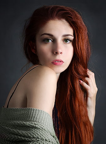 Studio Portrait of Young Woman With Red Hair