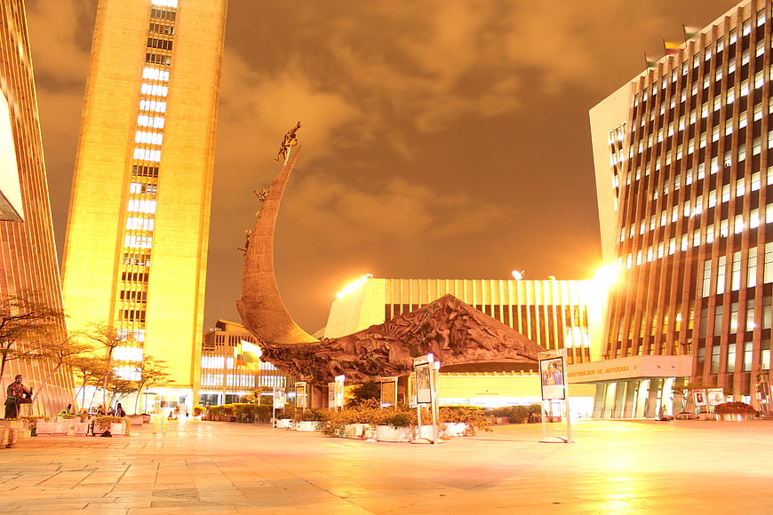 Medellin City Hall Plaza At Night With Monumental Sculpture