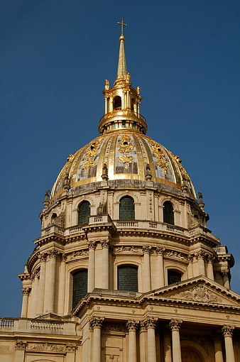Golden Dome of St Paul's Cathedral Against Blue Sky