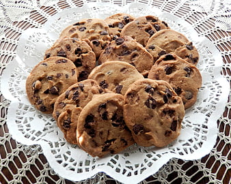 Homemade Chocolate Chip Cookies On White Doily
