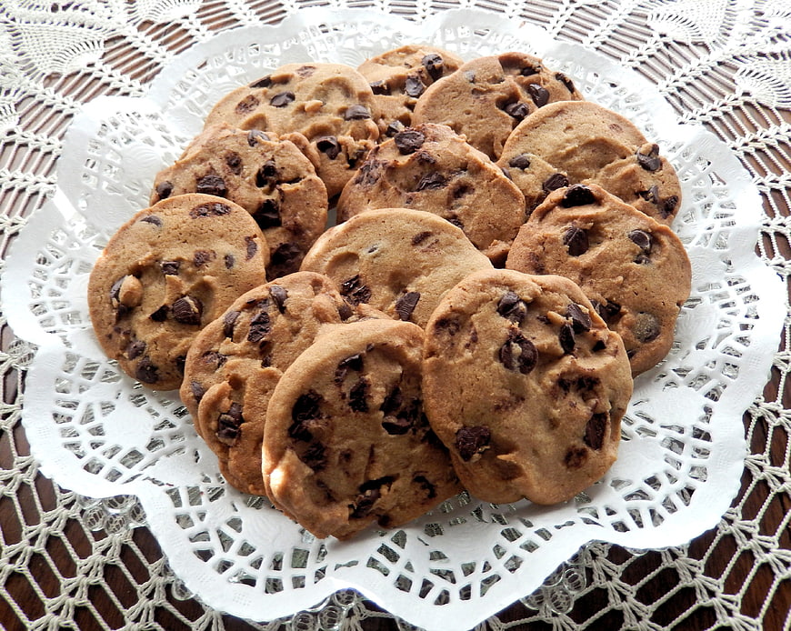 Homemade Chocolate Chip Cookies On White Doily