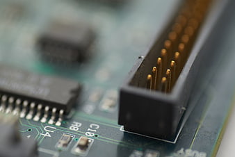 Macro shot of computer circuit board connector pins