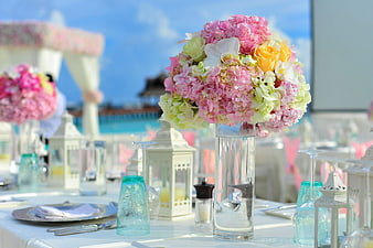 Pink and Yellow Floral Wedding Centerpiece on Beach Table