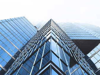 Low-Angle View of Modern Glass Skyscraper Facade
