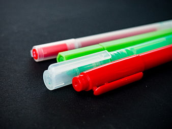 Colorful Highlighters on Black Background