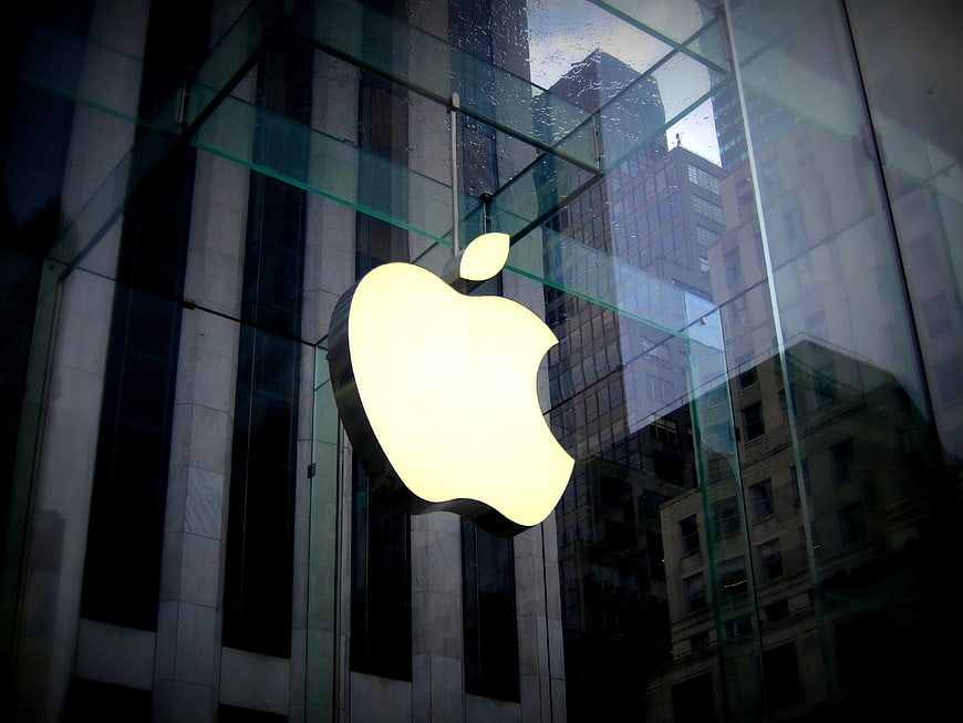 Illuminated Apple Store Logo on Glass Facade