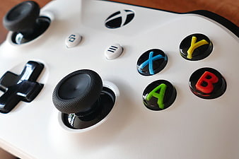 Close-up of White Xbox Controller with Colorful Buttons
