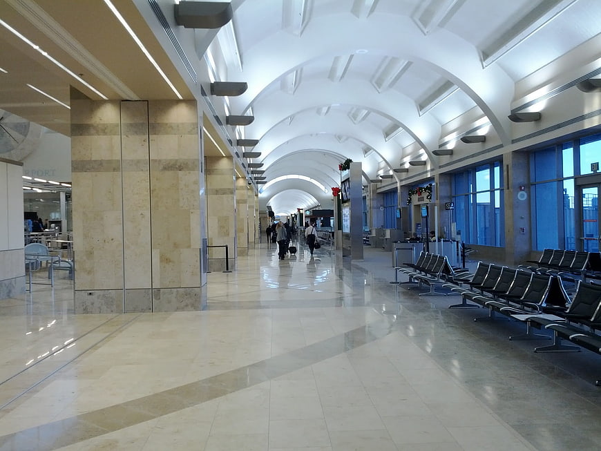 Spacious Airport Terminal Hallway with Arched Ceiling