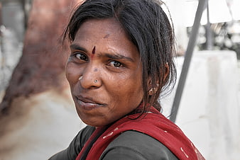 Portrait of Indian Woman with Traditional Jewelry and Red Scarf