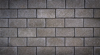 Textured gray stone brick wall pattern background