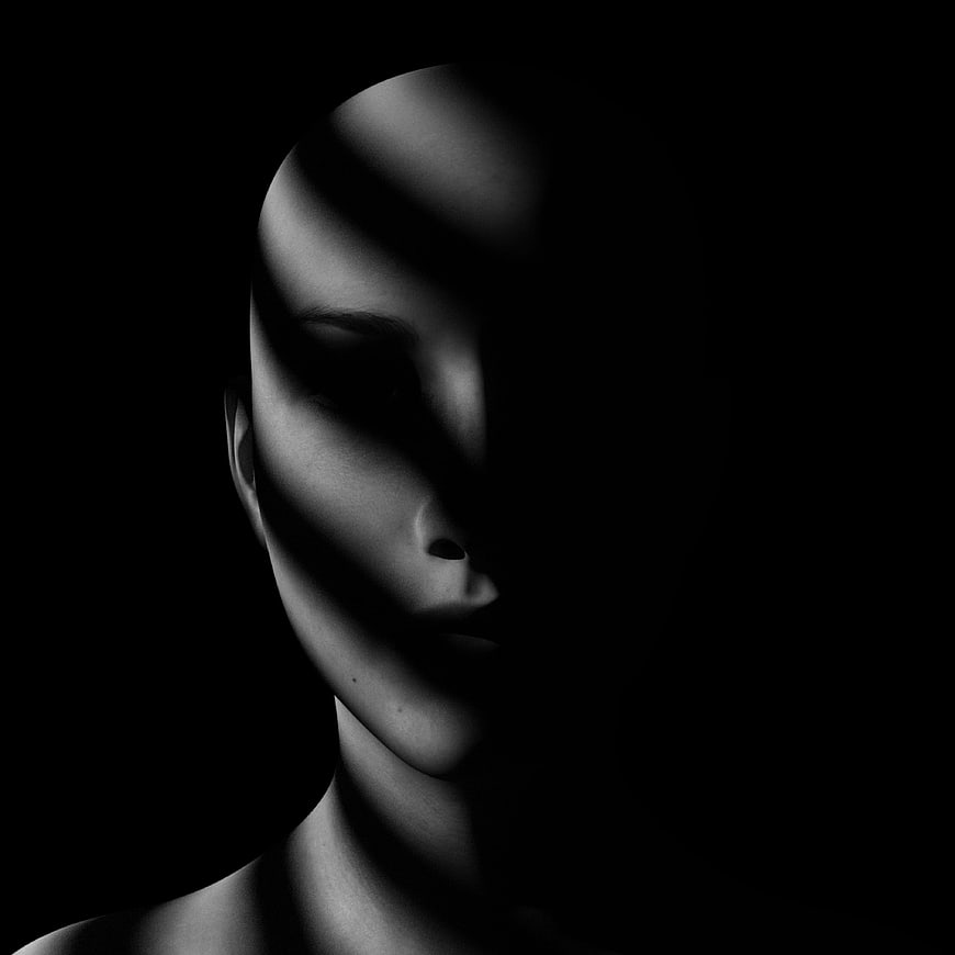 Dramatic Black and White Portrait of Woman in Shadow