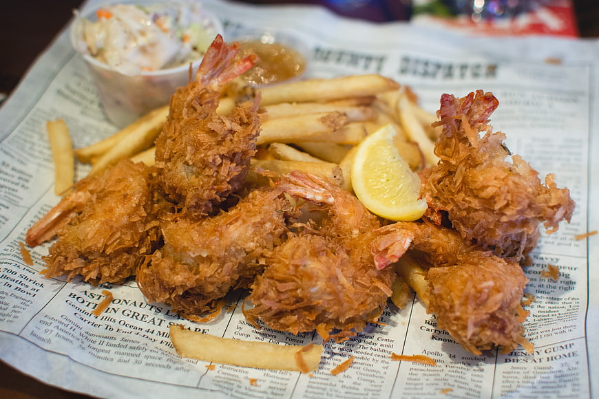 Fried Shrimp Platter with Fries and Coleslaw on Newspaper
