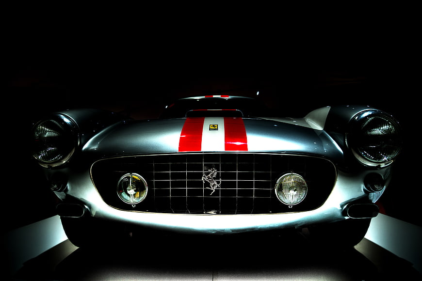 Front view of silver Ferrari 250 GTO with racing stripes