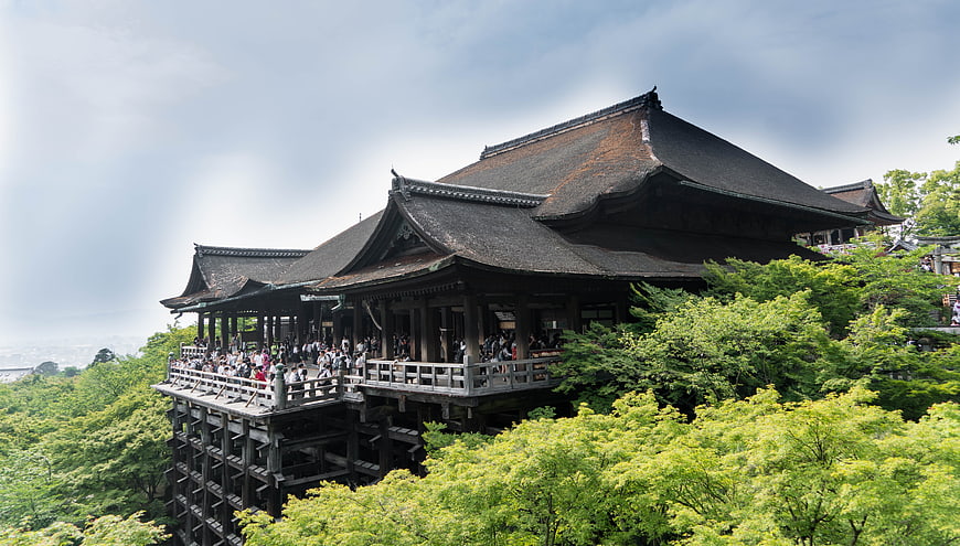 Kiyomizu-dera Temple in Kyoto Japan with Crowds and Green Foliage