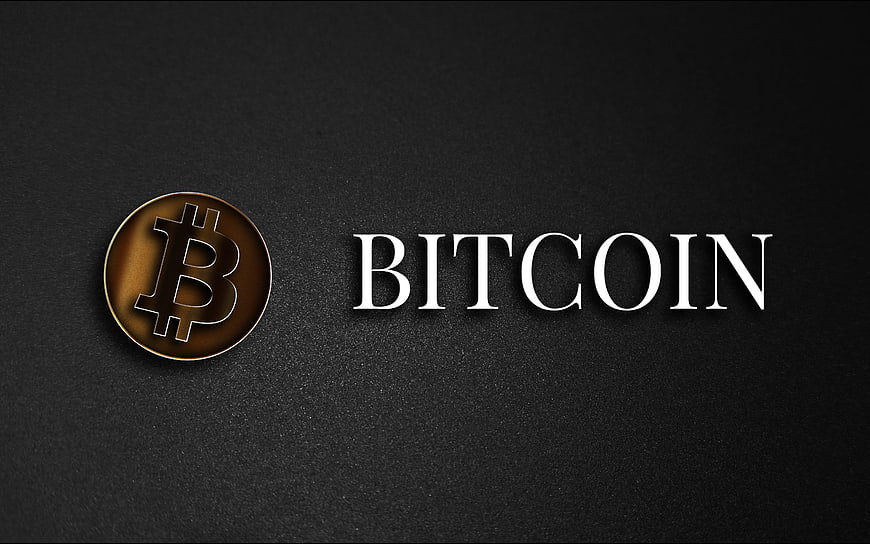 Golden Bitcoin Coin on Dark Textured Background