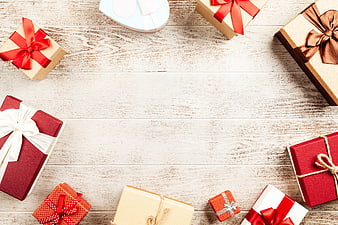 Christmas Gift Boxes Flat Lay With Copyspace On White Wood