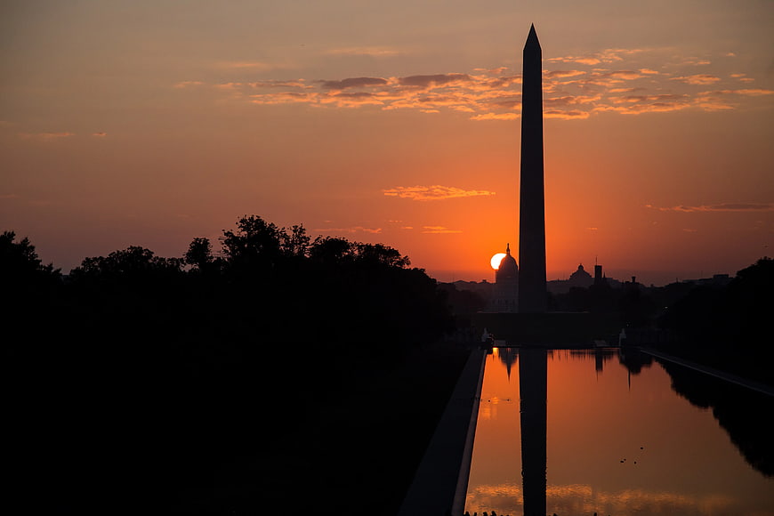 Washington Monument Silhouette at Sunset with Reflection