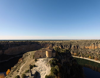 Hermitage of San Frutos on a cliff overlooking the Duratón River in Spain