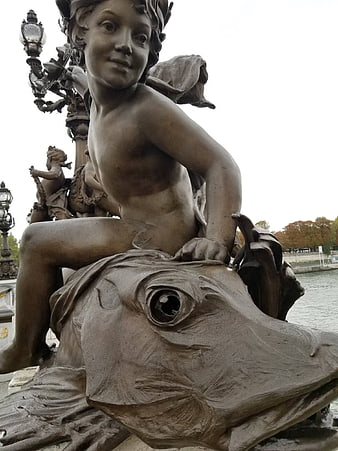 Bronze Statue of Cupid Riding a Fish in Paris