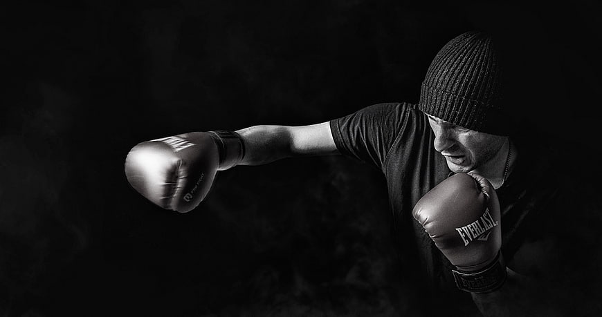 Boxer Punching in Black and White