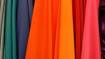 Vibrant Colorful Fabric Swatches Hanging in Vertical Rows