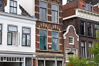 Traditional European Brick and White House Facades