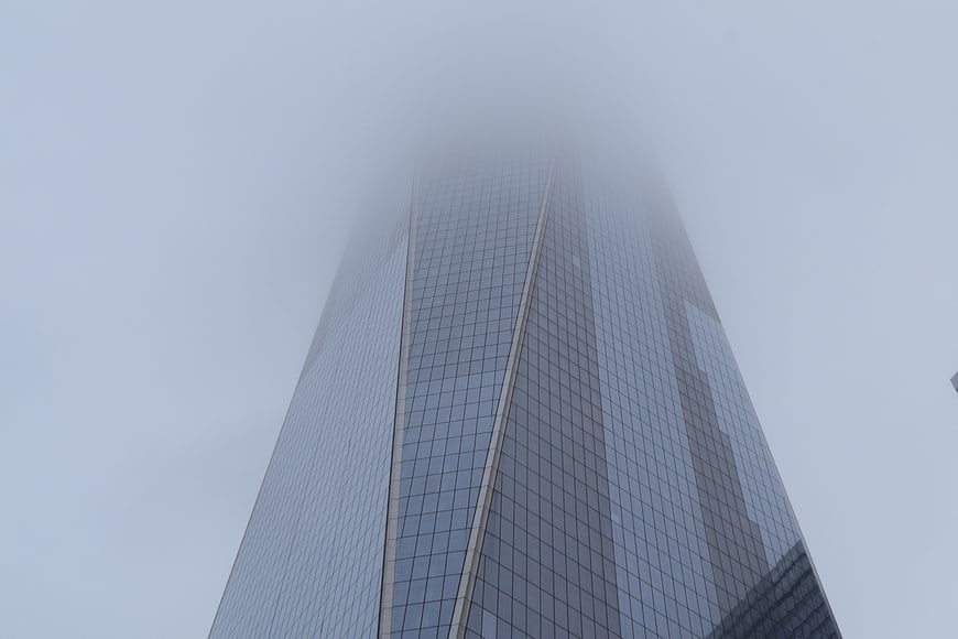 Modern Skyscraper Vanishing into Thick Fog
