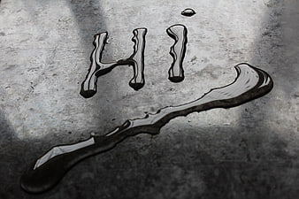 Water Droplets Forming The Word Hi On Textured Concrete Surface