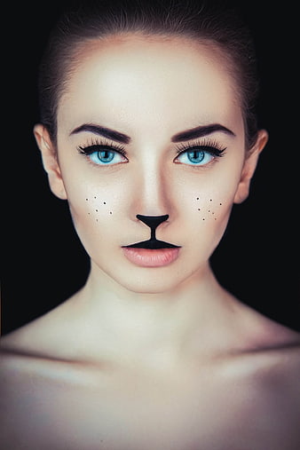 Creative Cat Makeup Portrait of Young Woman