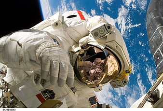 Astronaut Spacewalk with Earth and Reflection in Helmet