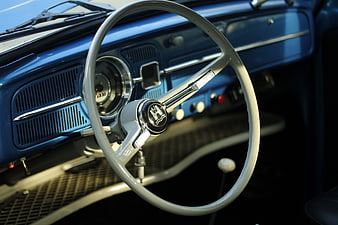Vintage Blue Car Interior with Classic Steering Wheel