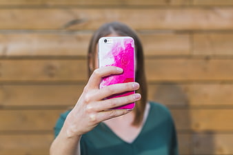 Woman Taking Selfie with Pink Phone Case