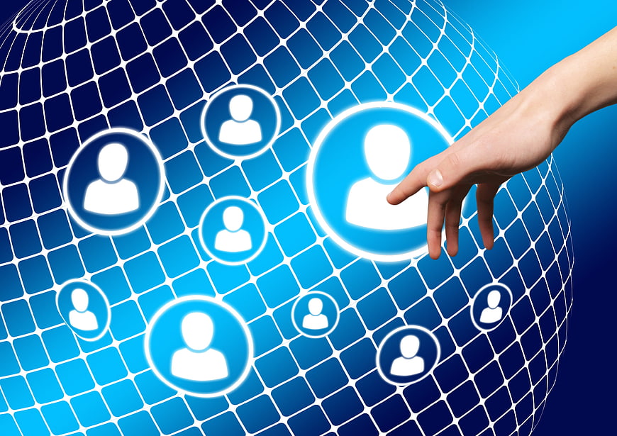 Hand touching social media icons on digital globe network
