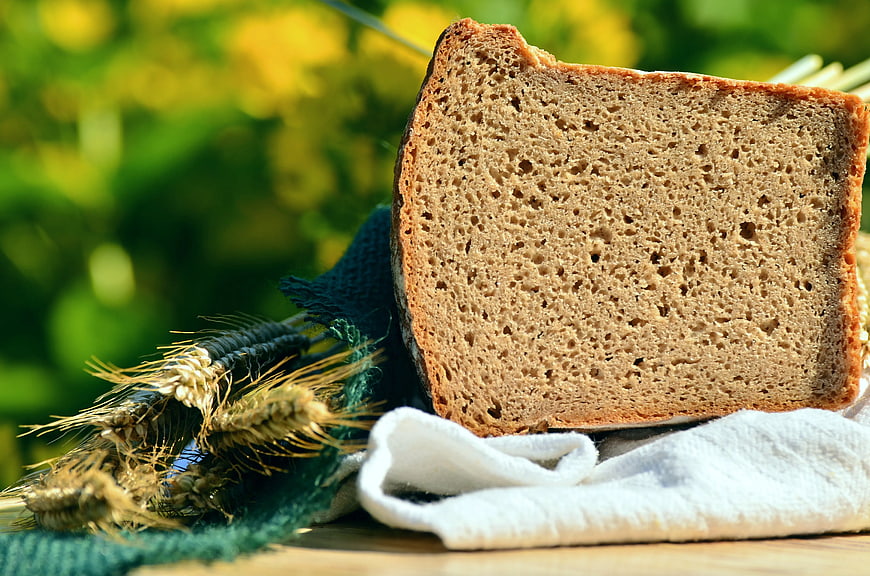 Fresh Sliced Whole Wheat Bread with Wheat Ears